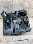Black 2015-20 Ford F150 Center Console Bezel Cup Holder & Shifter Assembly Used. Price: $290.00.