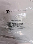 Genuine Moparf Armrest Cover - (7KX10TX7AB) New. Price: $75.00.