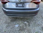 2019-2021 Volkswagen Jetta Rear Bumper Cover Some Loose Paint Gray Used. Price: $234.00.