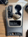 2016-2020 Grand Cherokee Center Console Shifter Bezel Trim W/cup Holder Oem T47 Used. Price: $100.00.