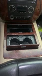 2007-2014 Chevrolet Tahoe Denali Center Console Cup Holder Tray Woodgrain Used. Price: $100.00.