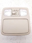 04-07 Toyota Highlander Limited Beige Front Overhead Roof Console Assembly Used. Price: $99.99.