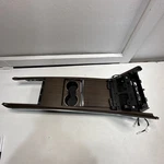 2021-2024 Tesla Model X Center Console Top Bezel Cover Panel & Cupholder Oem Used. Price: $140.00.