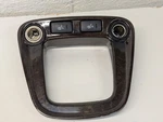 Toyota Highlander 2001 Shifter Power Outlet Trim Bezel Factory Woodgrain Used. Price: $31.00.