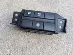 Left Side Button Assembly, For Nissan Leaf 2018-2023 (oem 251985SA0A) Used. Price: $60.00.