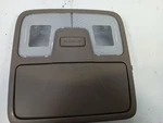Brown Front Overhead Roof Console From 2015 Hyundai Tuscon 12110384 Used. Price: $84.69.