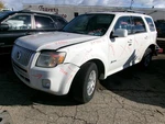 Used Front Lower Center Console Fits: 2010 Mercury Mariner Floor Hybrid W/voice. Price: $299.99.
