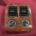 2004 Acura Mdx Radio Bezel W/vent & Controls Woodgrain Climate Used. Price: $55.00.