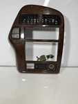 1996-2000 Oem Nissan Pathfinder Infiniti QX4 Wood Center Dash Radio Trim Bezel Used. Price: $69.99.