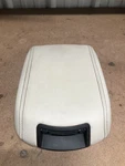 Damage 2010 - 2019 Ford Taurus Center Console Lid Armrest Tan Leather Used. Price: $38.00.