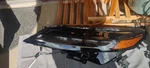2023-20245 Nissan Ariya Genuine Left Headlamp Assembly 26060-5MR0A Used. Price: $400.00.