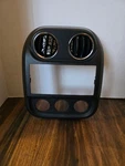 11-17 Compass Patriot Center Dash Radio A/c Heater Trim Bezel Panel Vents Oem Used. Price: $33.00.