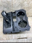 Black 2015-20 Ford F150 Center Console Bezel Cup Holder & Shifter Assembly Used. Price: $290.00.