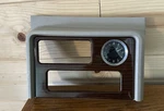 Tan/beige 2003-2006 Cadillac Escalade Center Console Wood Upper Bezel W/ Clock Used. Price: $40.50.