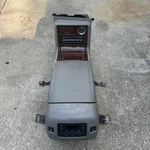 04 2005 Cadillac Escalade Center Floor Console Shale With Wood Grain Used. Price: $400.00.