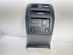 2014-2020 Nissan Pathfinder Console Rear Trim W/110V Receptacle Oem Used. Price: $209.00.