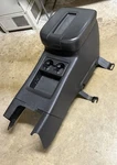 2009 Chevy Suburban Floor Center Console Storage Bin Armrest Oem Factory Used. Price: $500.00.